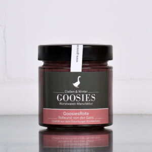 Rotwurst der Goosies Wurstwarenmanufaktur im 175-g-Glas, auf einem Edelstahltisch vor wei&szlig;em Hintergrund